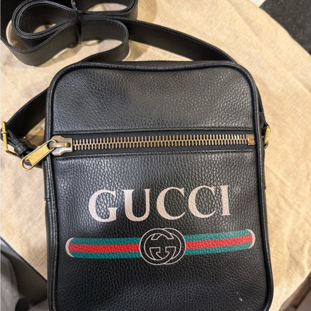 Gucci Black Leather Messenger Bag with Gold Accents